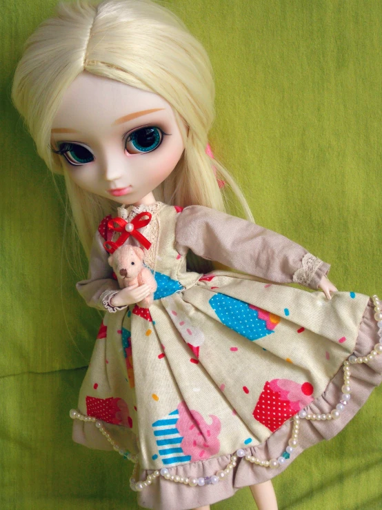 doll dressed up with a dress and long hair