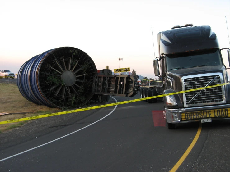 a large truck has crashed into a vehicle