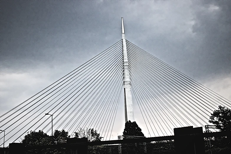 the spire of a building against a gray sky