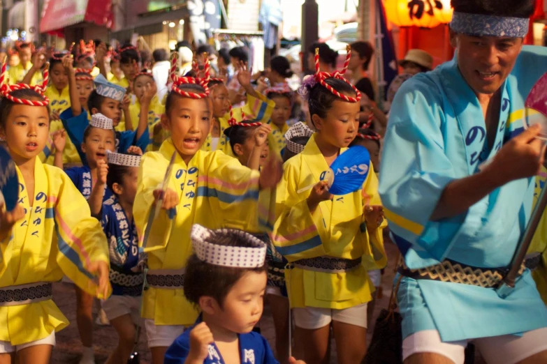 a group of people are dressed up and performing in costume