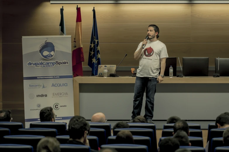 there is a man that is standing in front of a podium