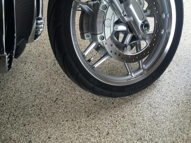 motorcycle tire and ke rim in a showroom