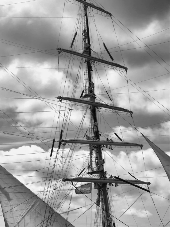 a black and white image of a boat in the water