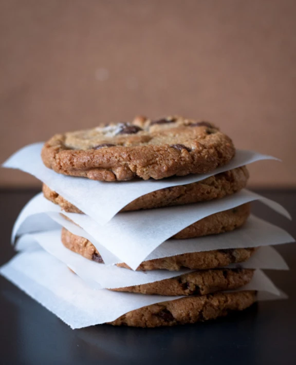 chocolate chip cookies stacked on top of each other