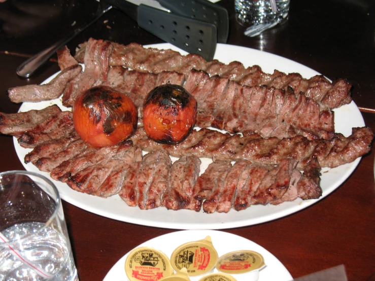 a grill with different types of food on a plate