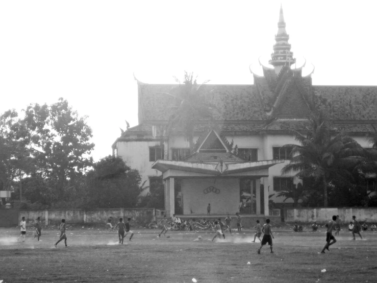 an old po of a park with people playing a game