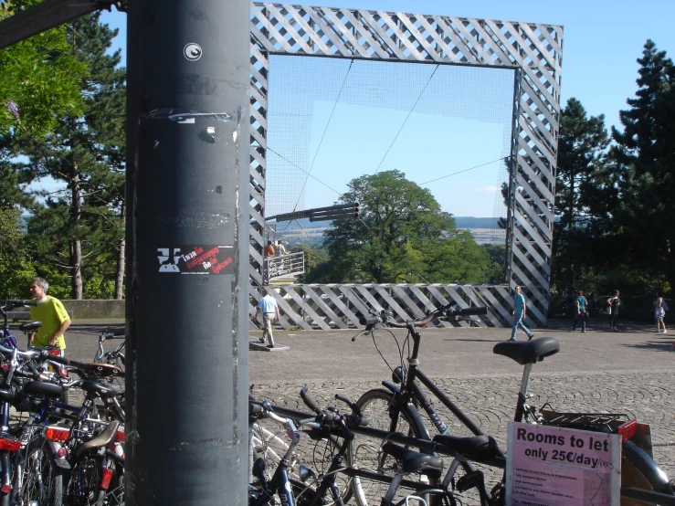 there are several bikes parked at the bus stop