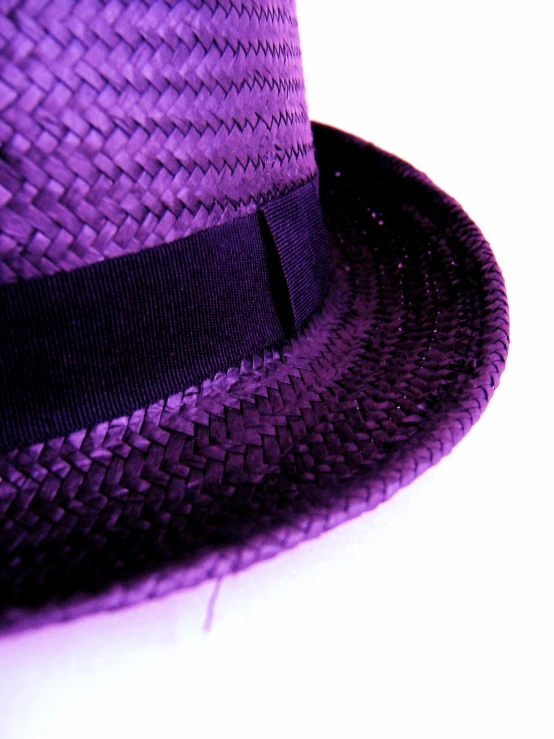 the purple hat is on display on the table