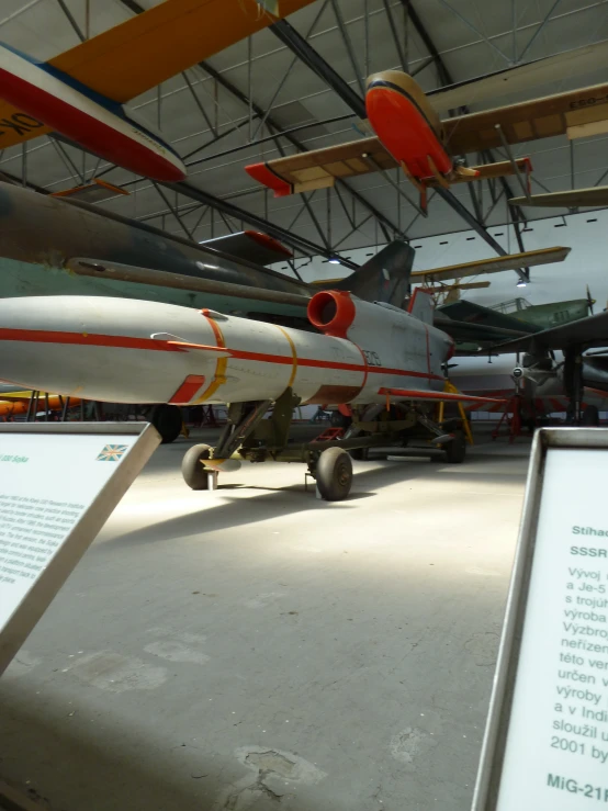 an air museum with different fighter jets on display