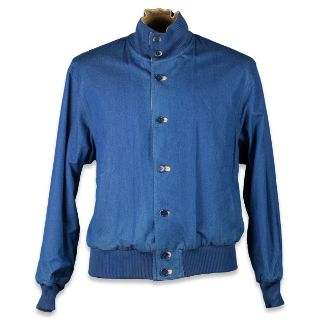 a blue shirt and jacket on a hanger