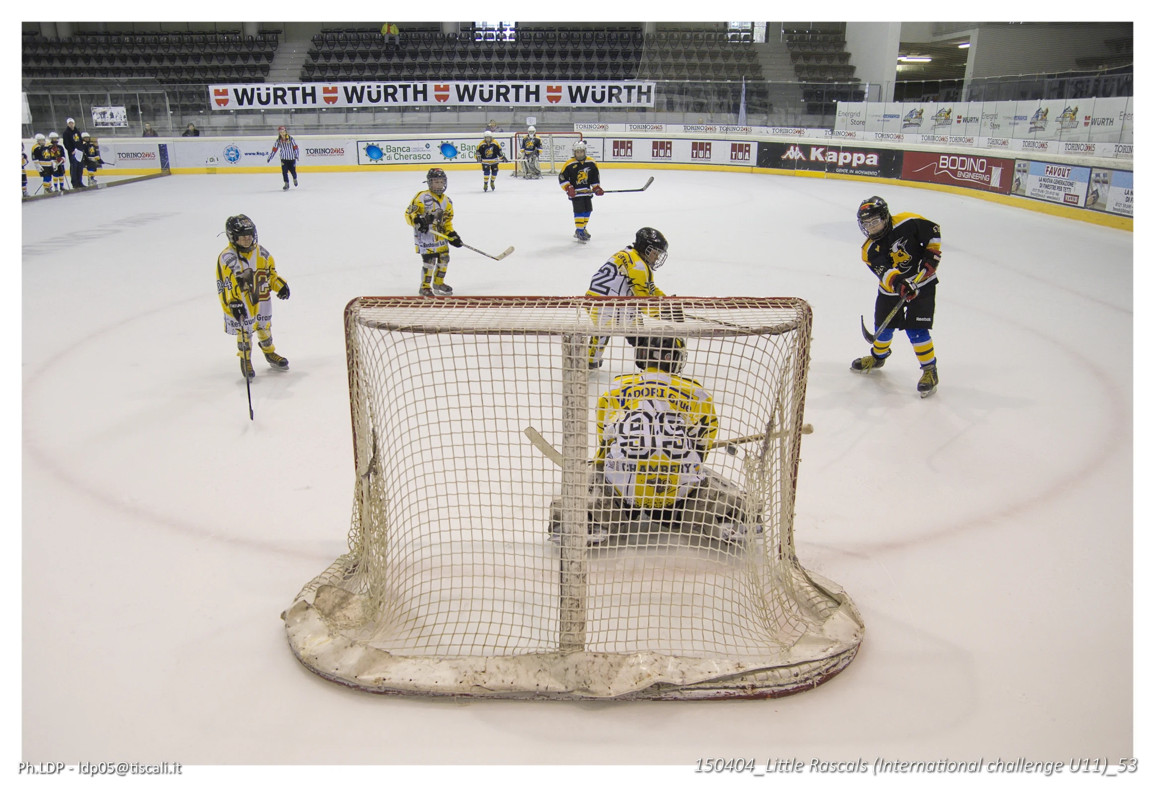 a bunch of hockey players warming up at the rink