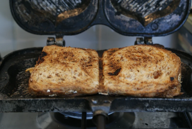 two slices of toast sitting in a pan