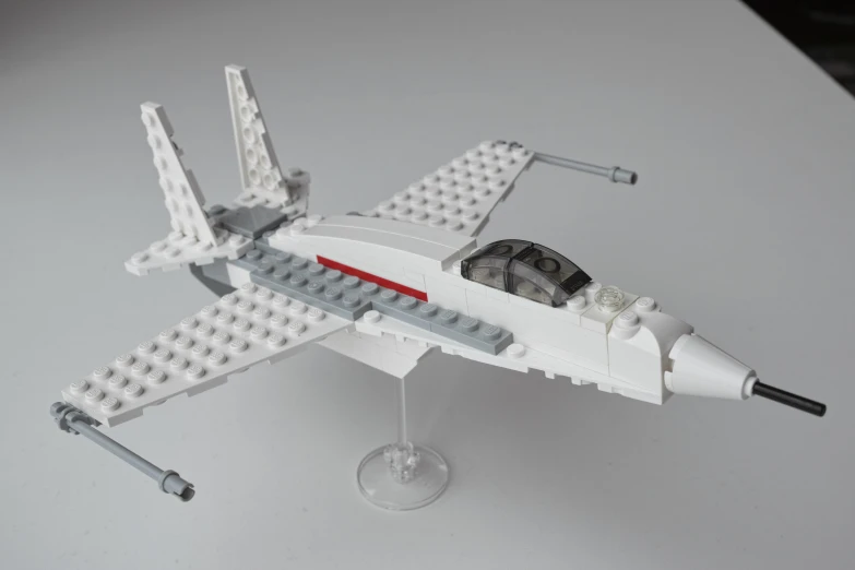 a lego model plane on top of a table