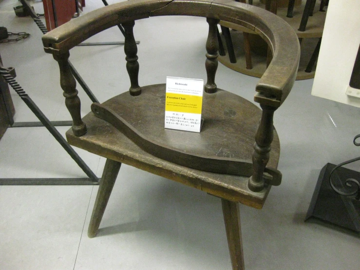 a chair has a tag on it and other items