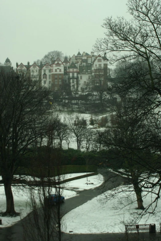 a city sits near an area with snow