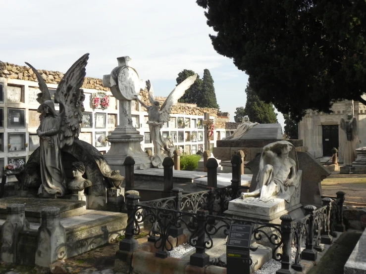 old cemetery in front of many large building