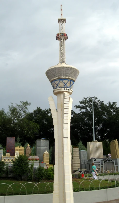 a tower made of tiles is shown in the park