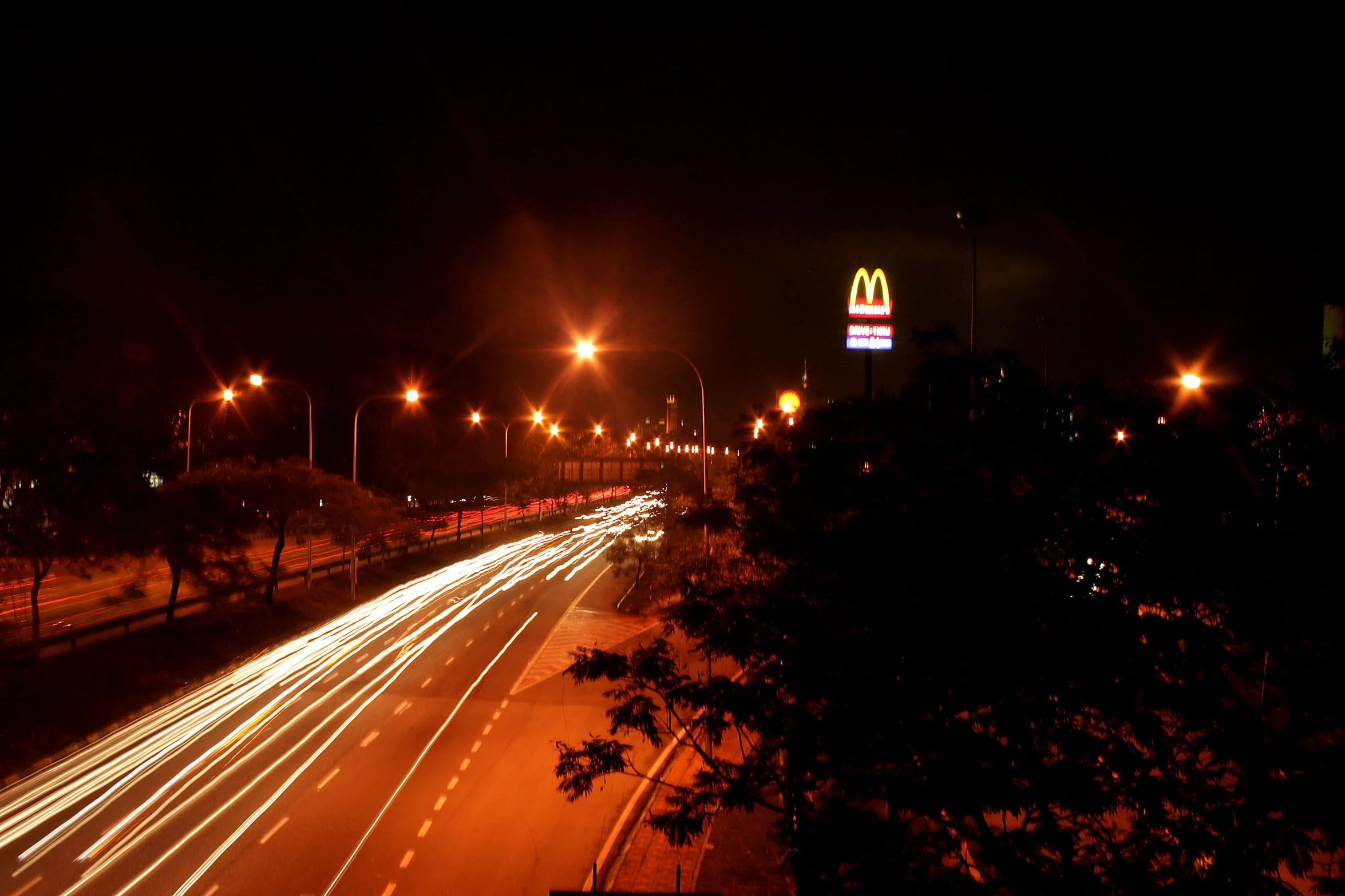 night time s of cars on highway with traffic