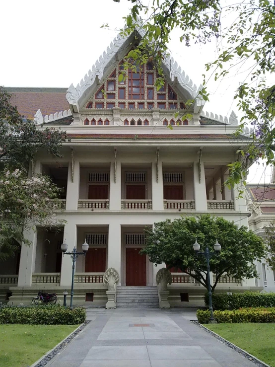 the house is surrounded by an expansive yard