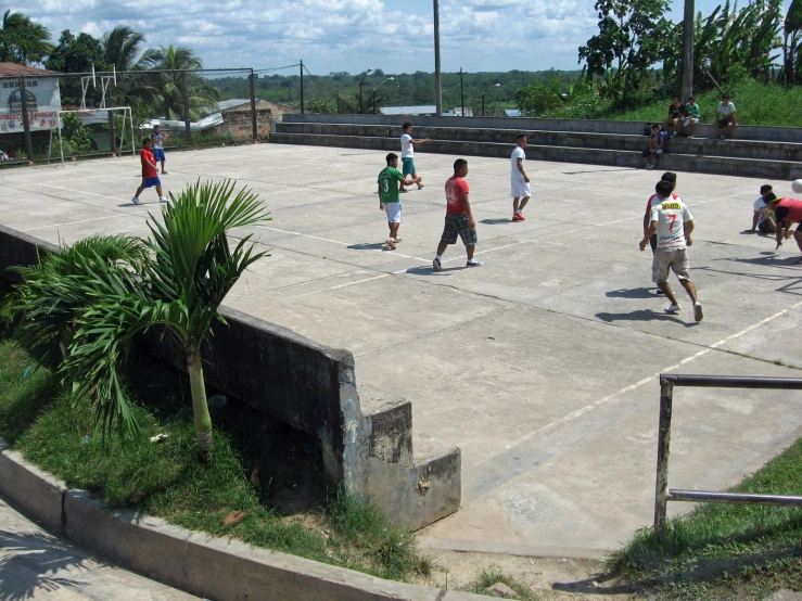 children play volleyball in an open outdoor park