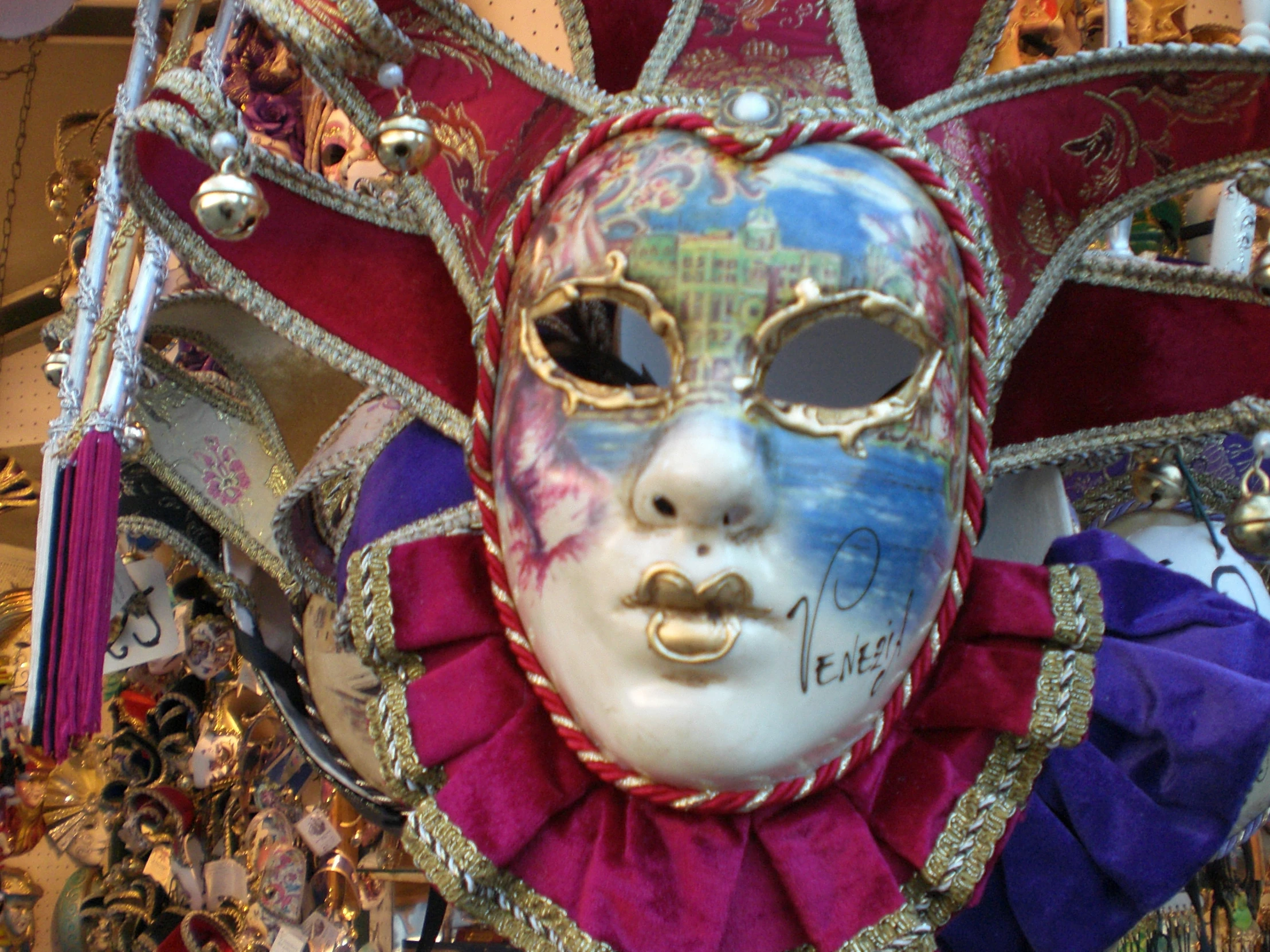 a colorful mask in the shape of a woman's head