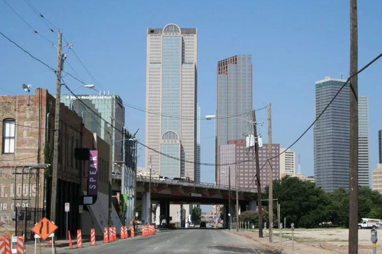 the city skyline has tall buildings in it