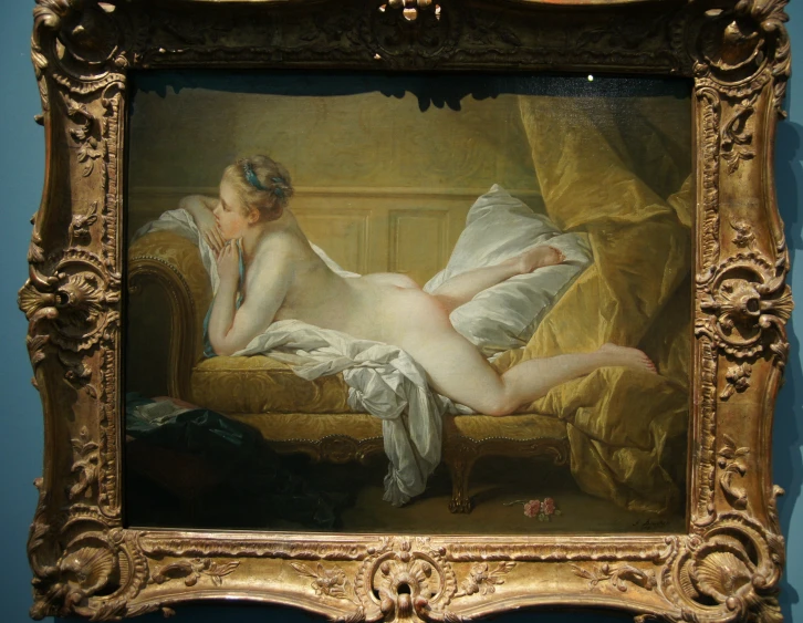a painting with a beautiful woman laying down