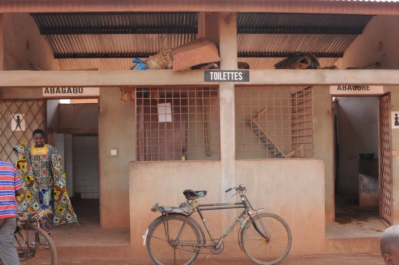 a bike is parked outside of an older building