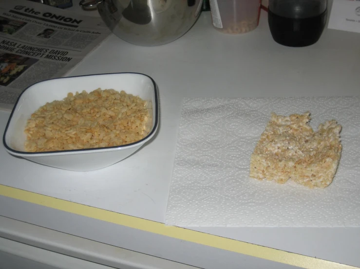 there are two bowls with food in them on the counter