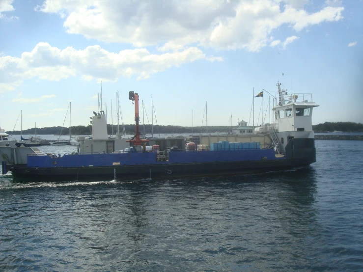 a boat sails by in the ocean