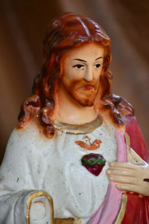 a statue of jesus with a white beard