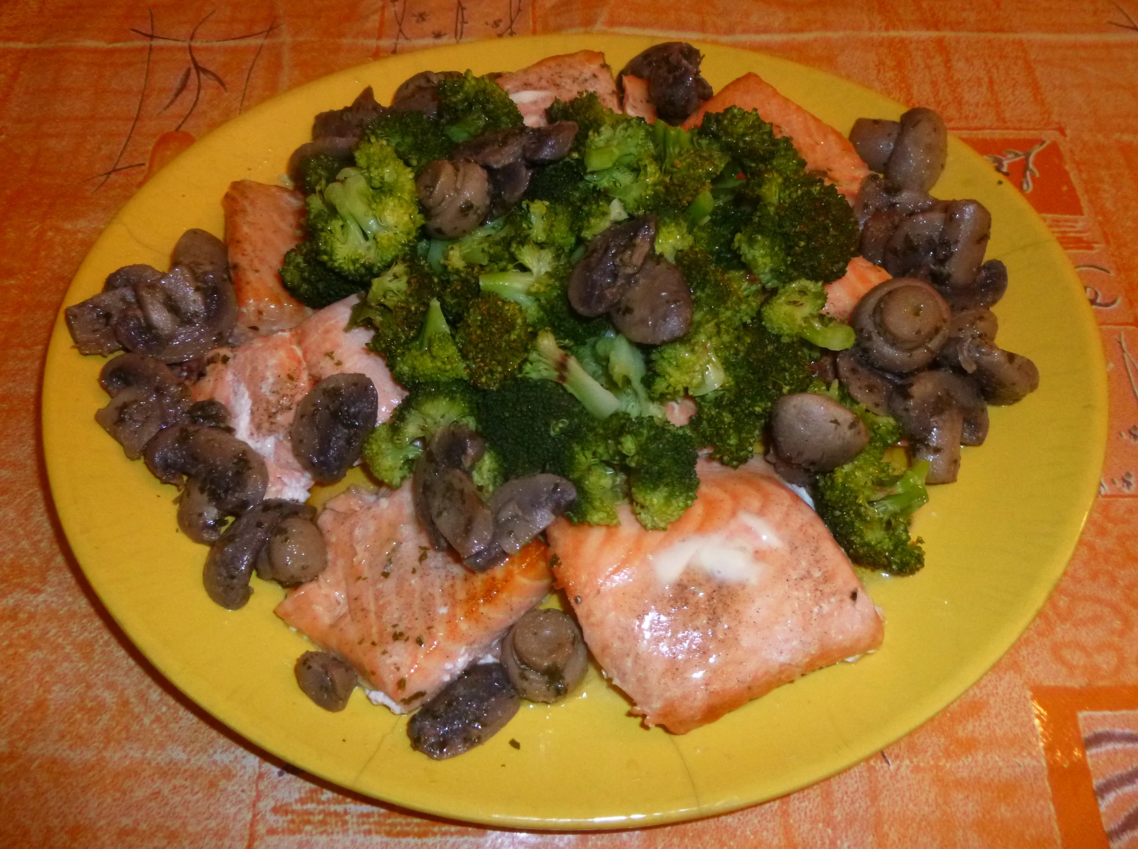 broccoli is shown with mushrooms and other vegetables