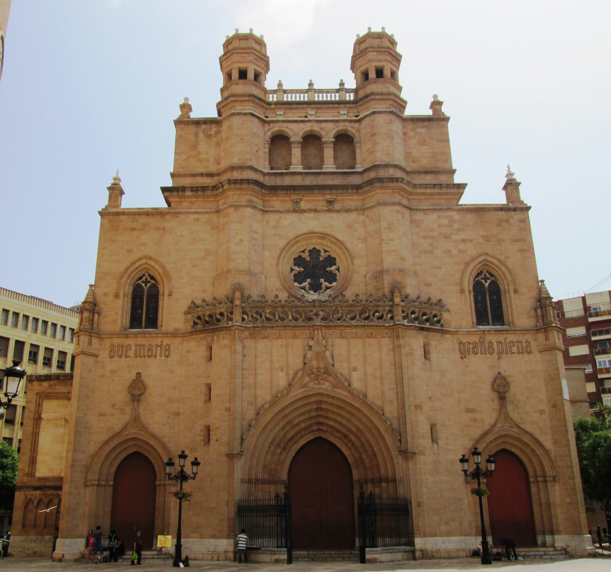 a brown and tan stone cathedral is seen