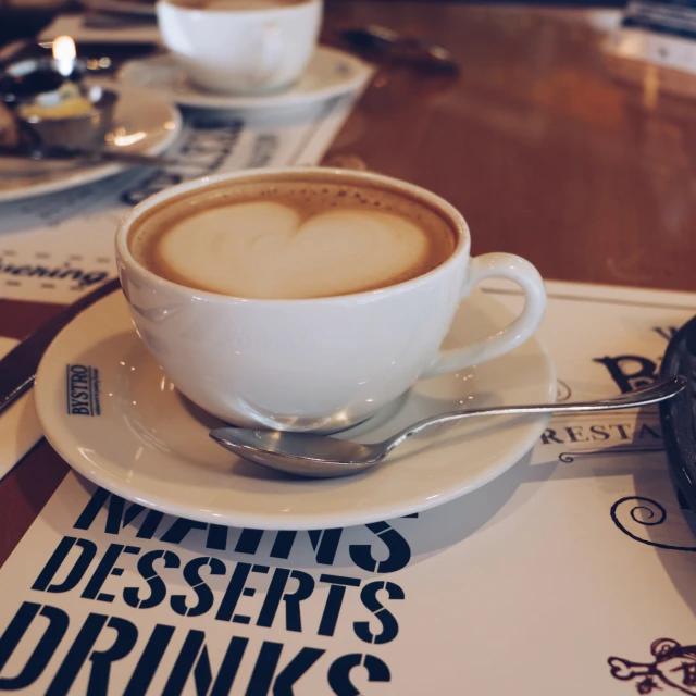 the coffee is served on a saucer and is ready to be eaten