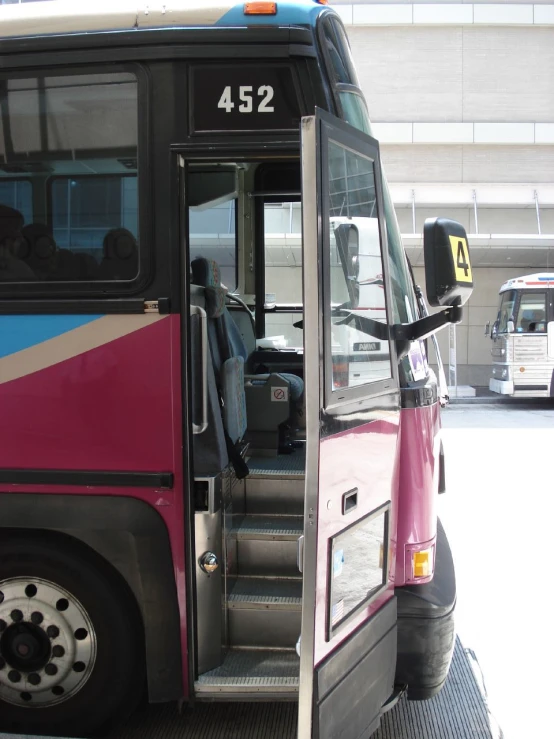 the side view of a bus and its driver