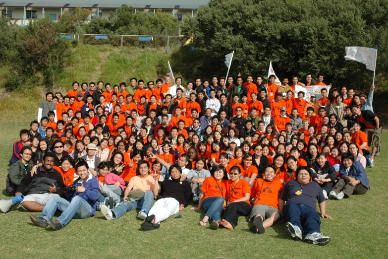 a large group of people are posing for a po