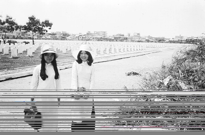 an old po of two girls wearing hats