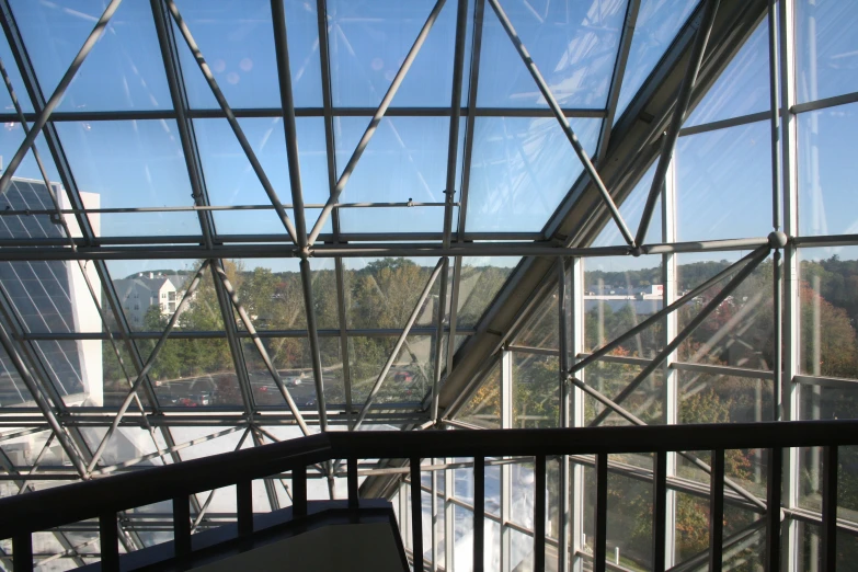 the view of a high rise building through glass from inside