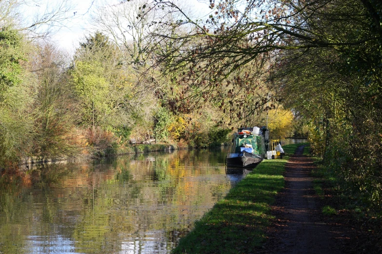 there is a small boat that is near the water