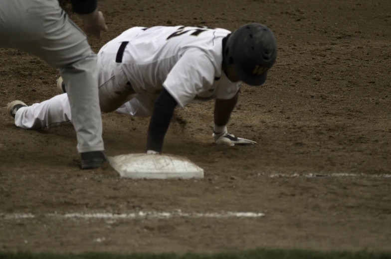 some people playing baseball and some players are on the field