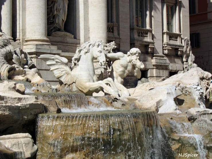 the statues and fountains are on display outside