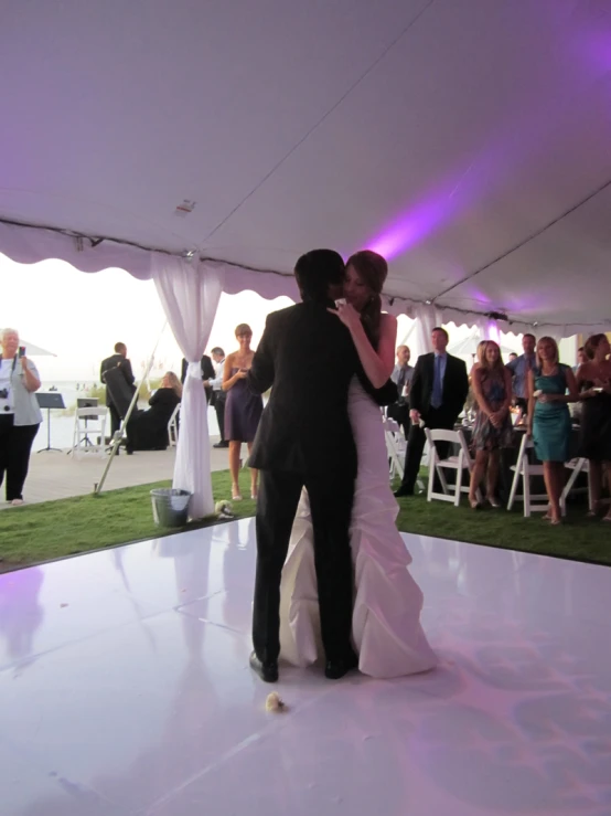 bride and groom dance at their wedding reception