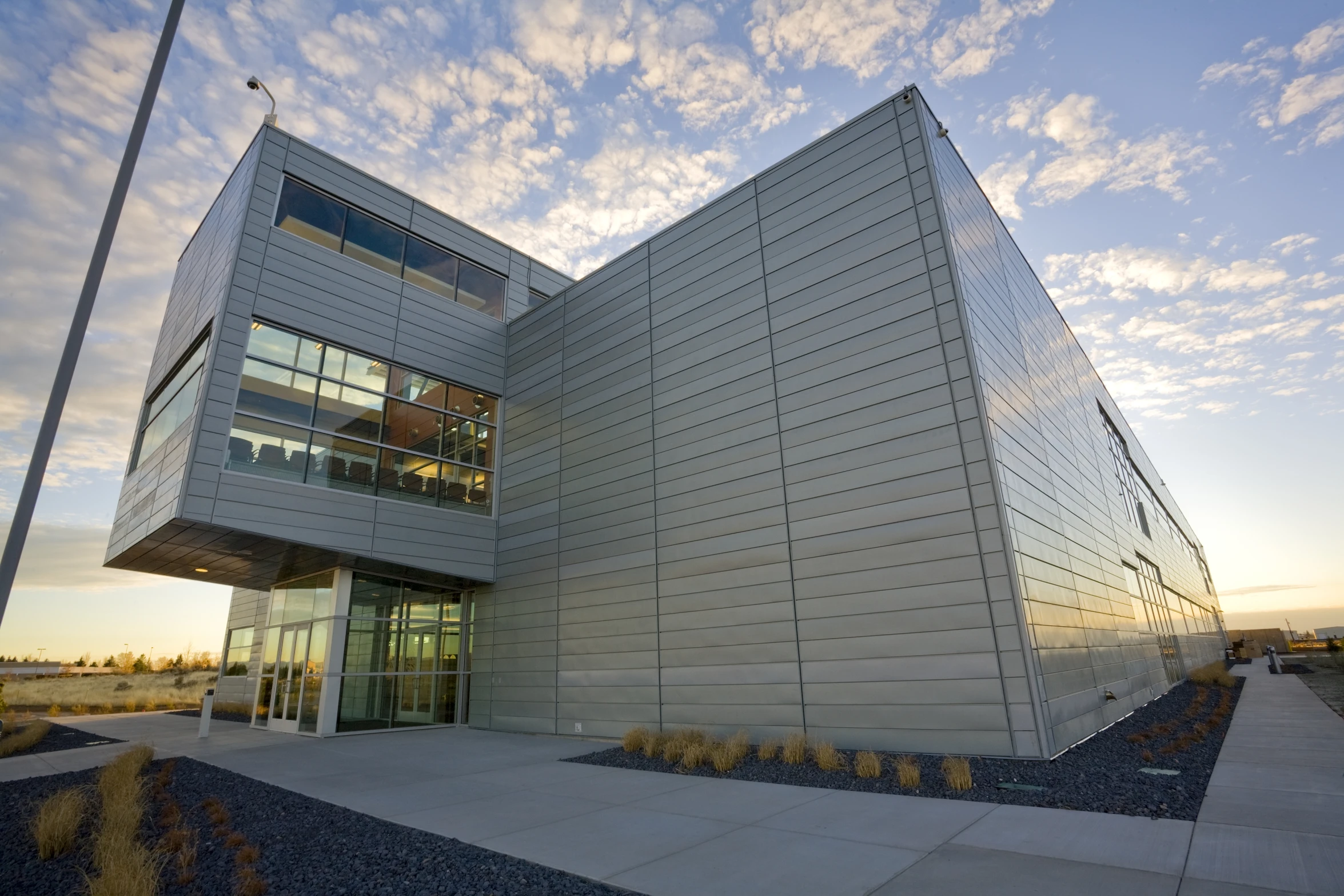 a large building with a lot of windows near the ground