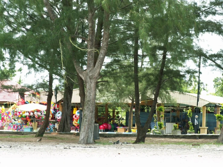 a small fair with lots of colorful items in the background