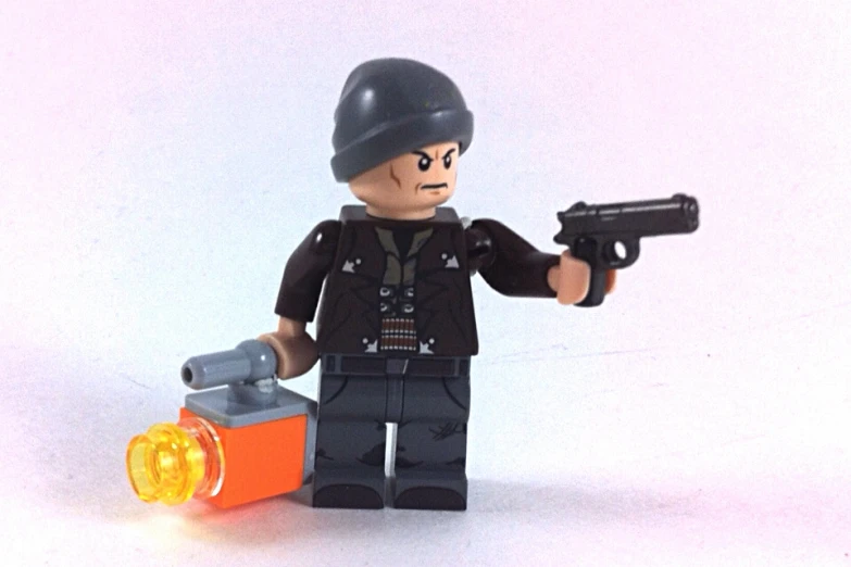 there is a lego figure that has a gun