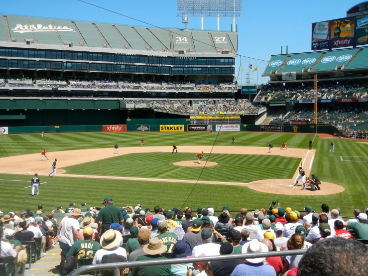 some baseball players playing baseball on a field