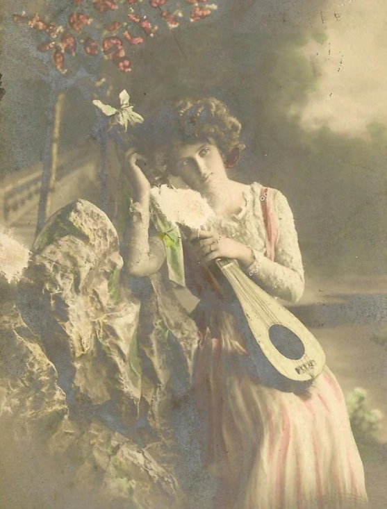 an old po of a woman holding flowers