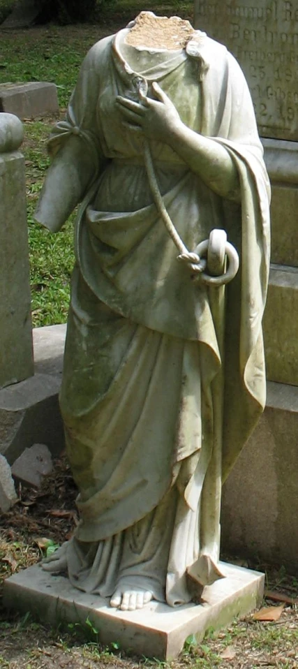 a statue is shown on a cement platform