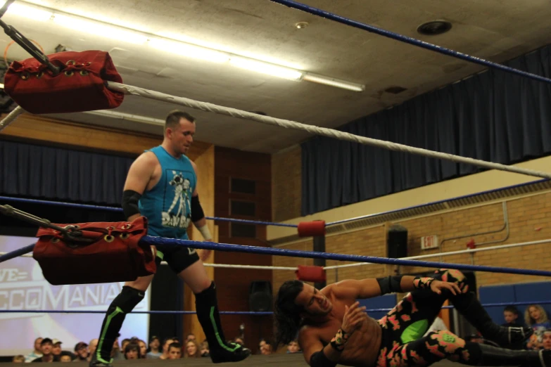 a wrestlers face down during a wrestling match