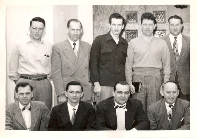 a vintage po of men in suits and ties